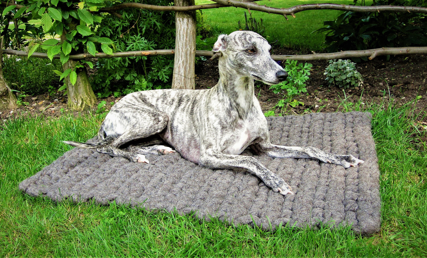 Felted dog mat made from virgin sheep's wool, carrying strap included